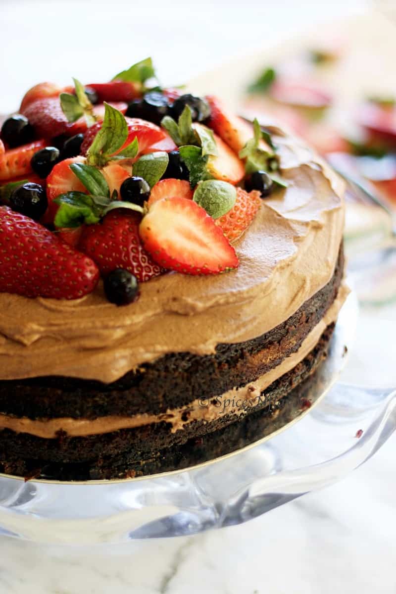 close up image of one bowl chocolate cake with berries