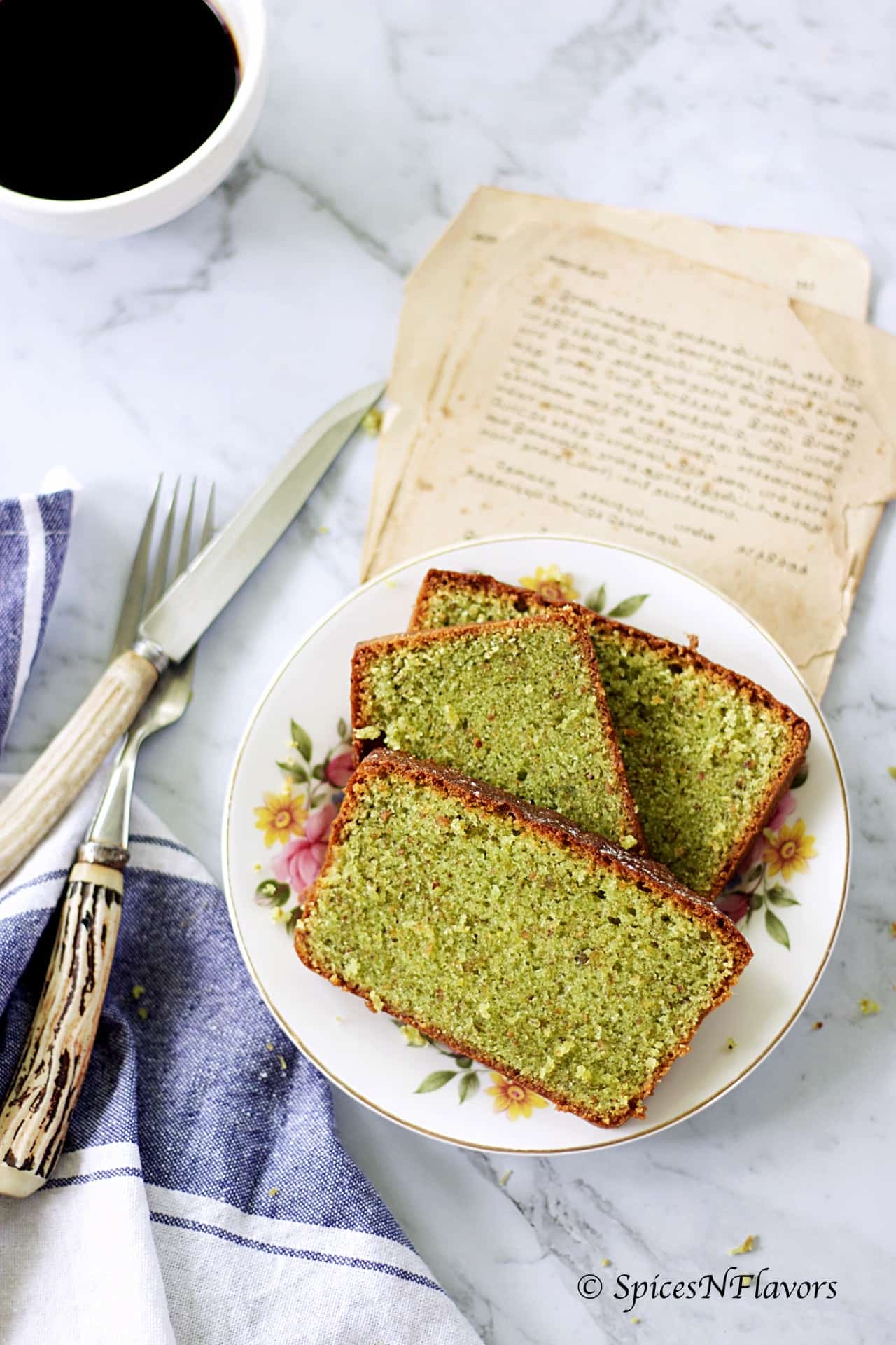 horizontal image of pistachio loaf cake showing the texture