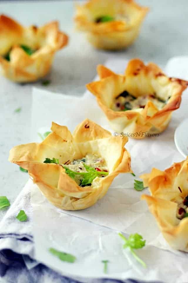 image of easy spanokopita or spinach and feta cups showing the crispy exterior of the cups