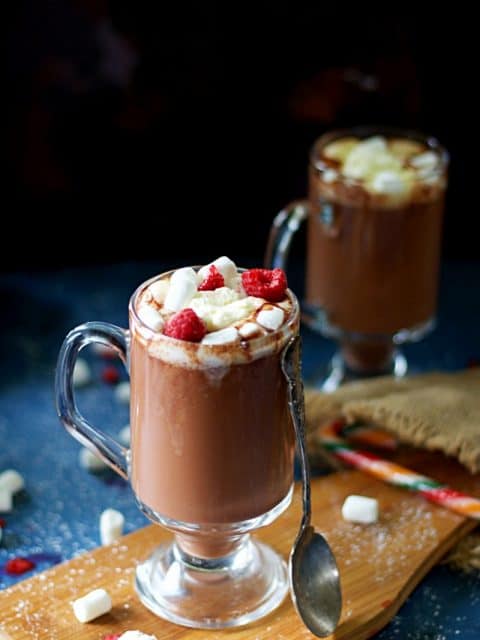 vertical image of raspberry hot chocolate drink