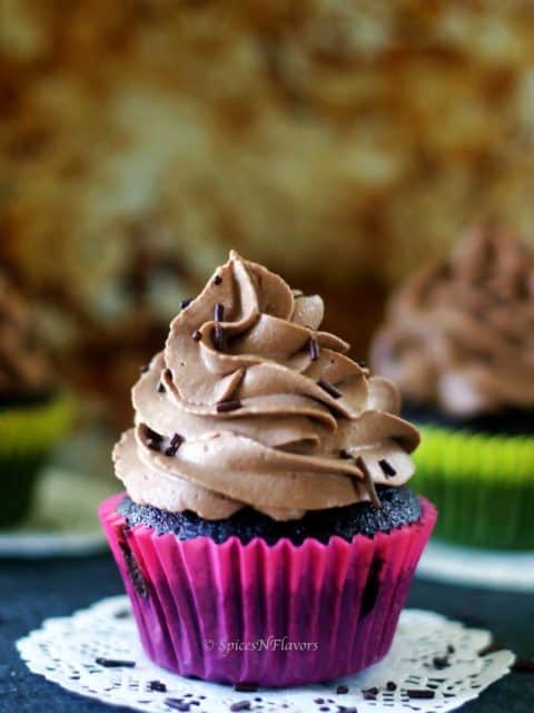 vertical view of vegan chocolate cupcakes