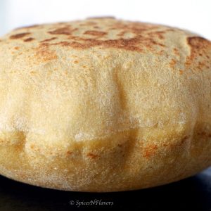 image showing puffed up instant pot whole wheat pita bread