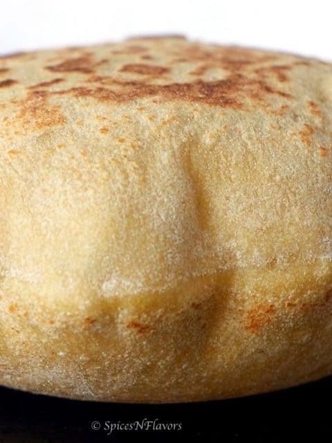 image showing puffed up instant pot whole wheat pita bread