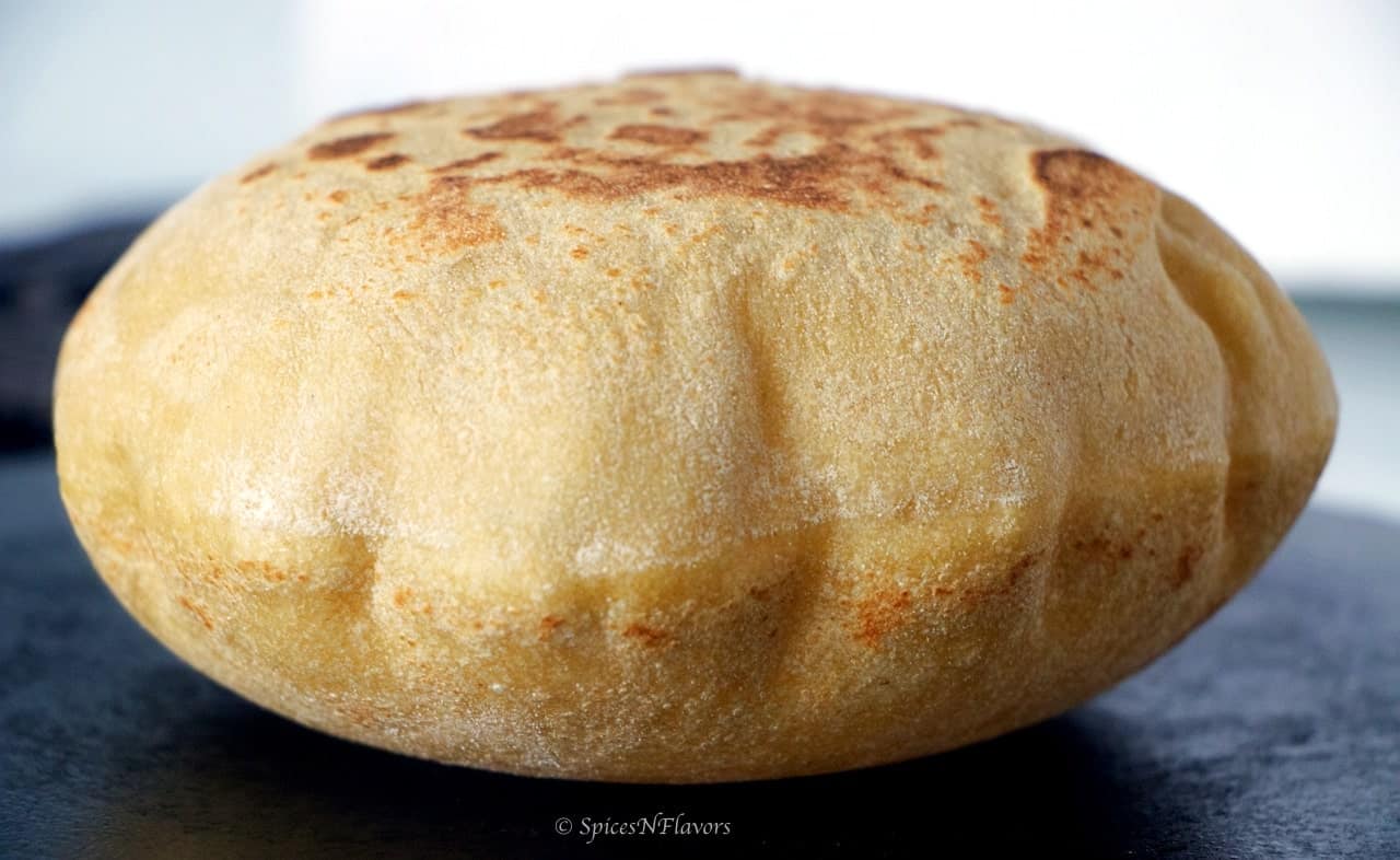 image showing puffed up instant pot whole wheat pita bread