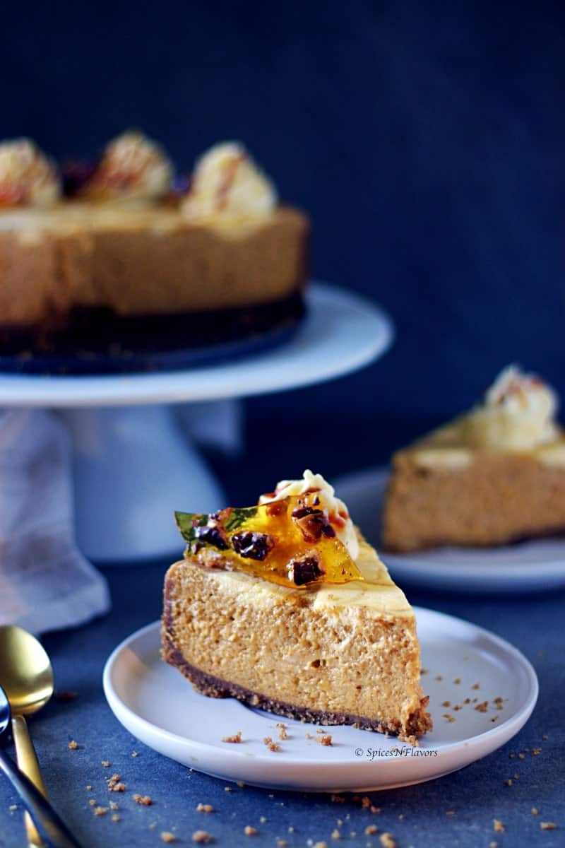 a slice of the best pumpkin cheesecake