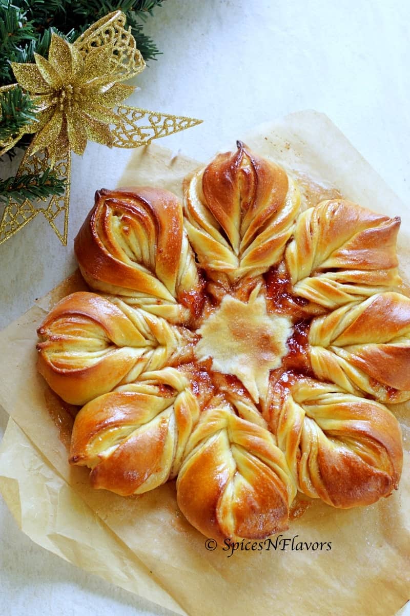 image of star bread brushed with just butter to reveal the golden colour and glossy effect