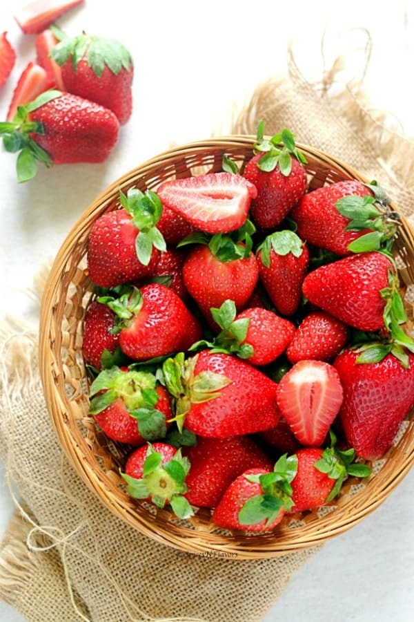 a basket full of fresh strawberries