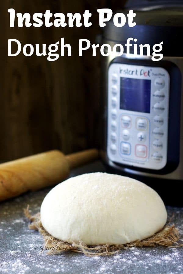 proofed bread dough placed on a towel with a rolling pin and instant pot in the background