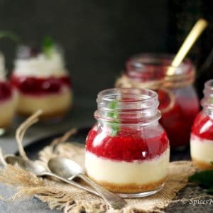 new york style cheesecake made in mason jar placed on a jute towel in a cake pan