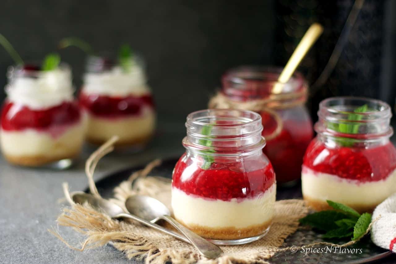 new york style cheesecake made in mason jar placed on a jute towel in a cake pan