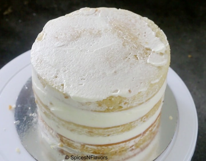 crumb coated the cake with whipped cream