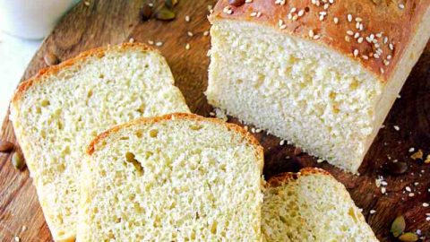three bread slices placed on a wooden board