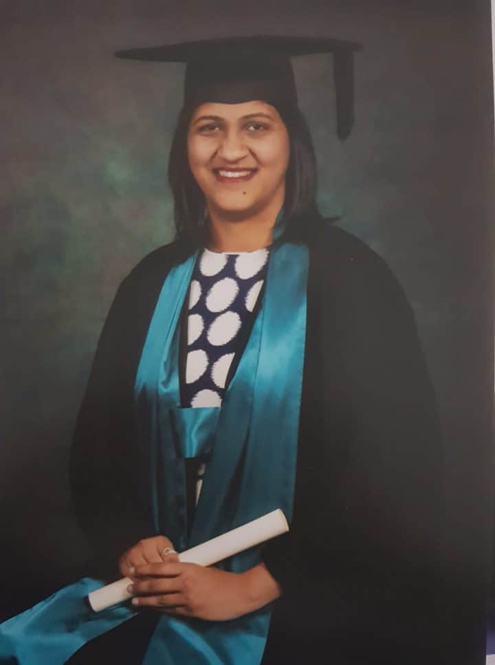 a photo of the author on her graduation day