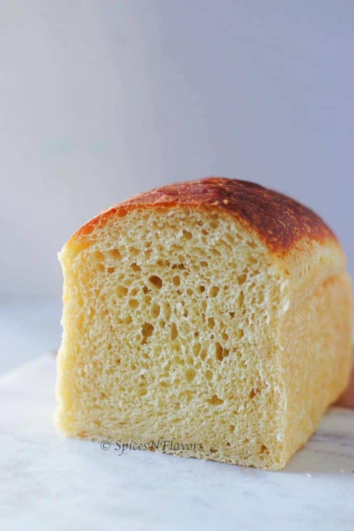 half cut bread showing the texture from within