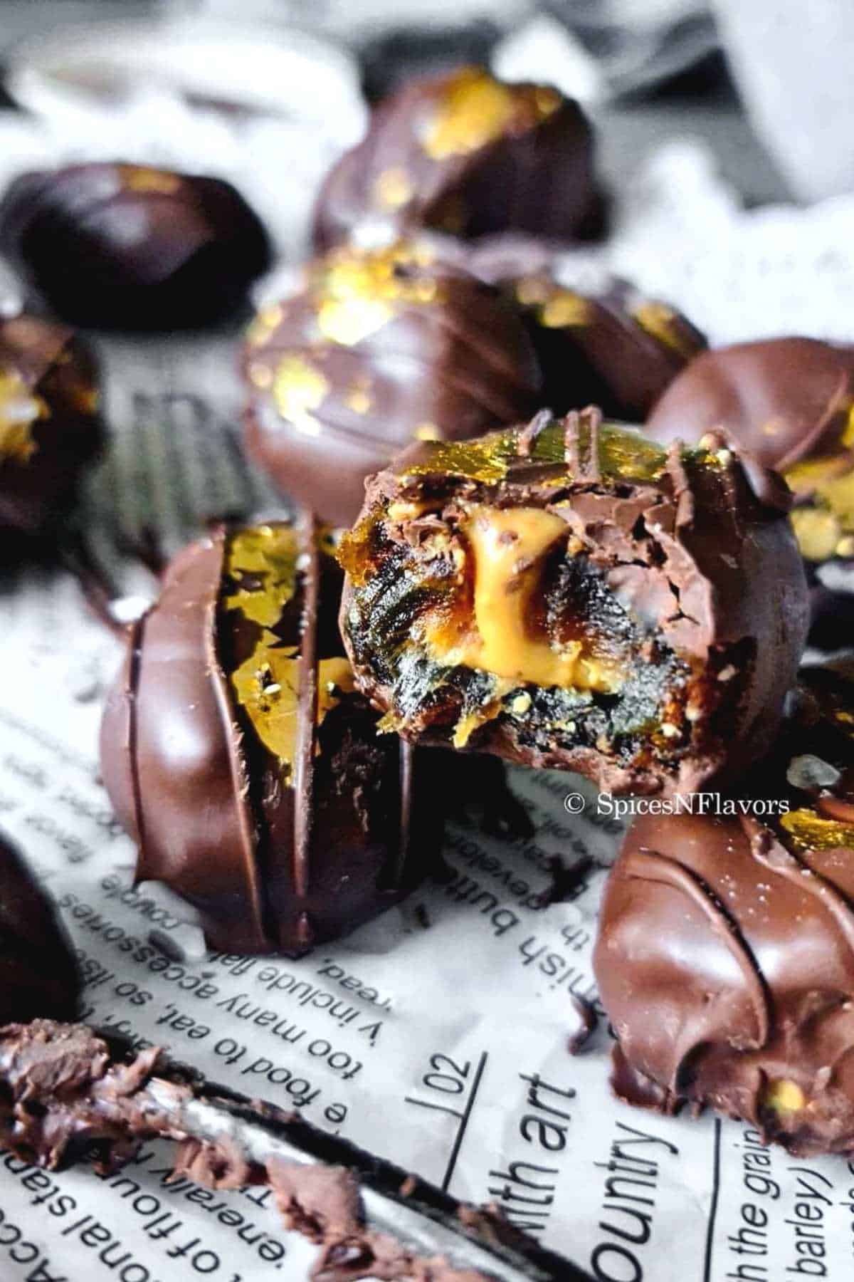 stuffed dates sliced in the middle to show the peanut butter oozing from inside
