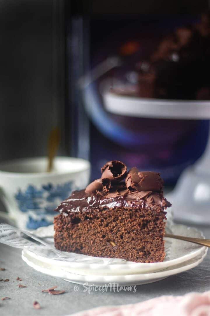 slice of chocolate cake placed on white plate