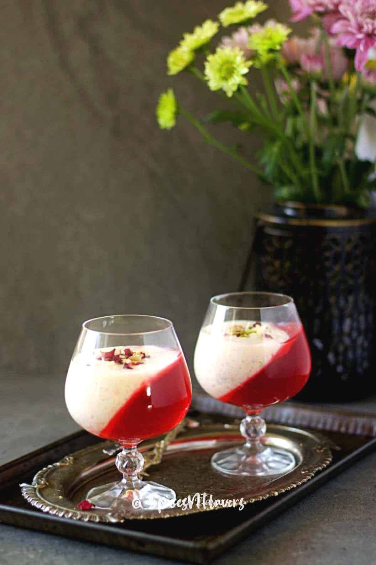 rice kheer served with jelly in wine glasses