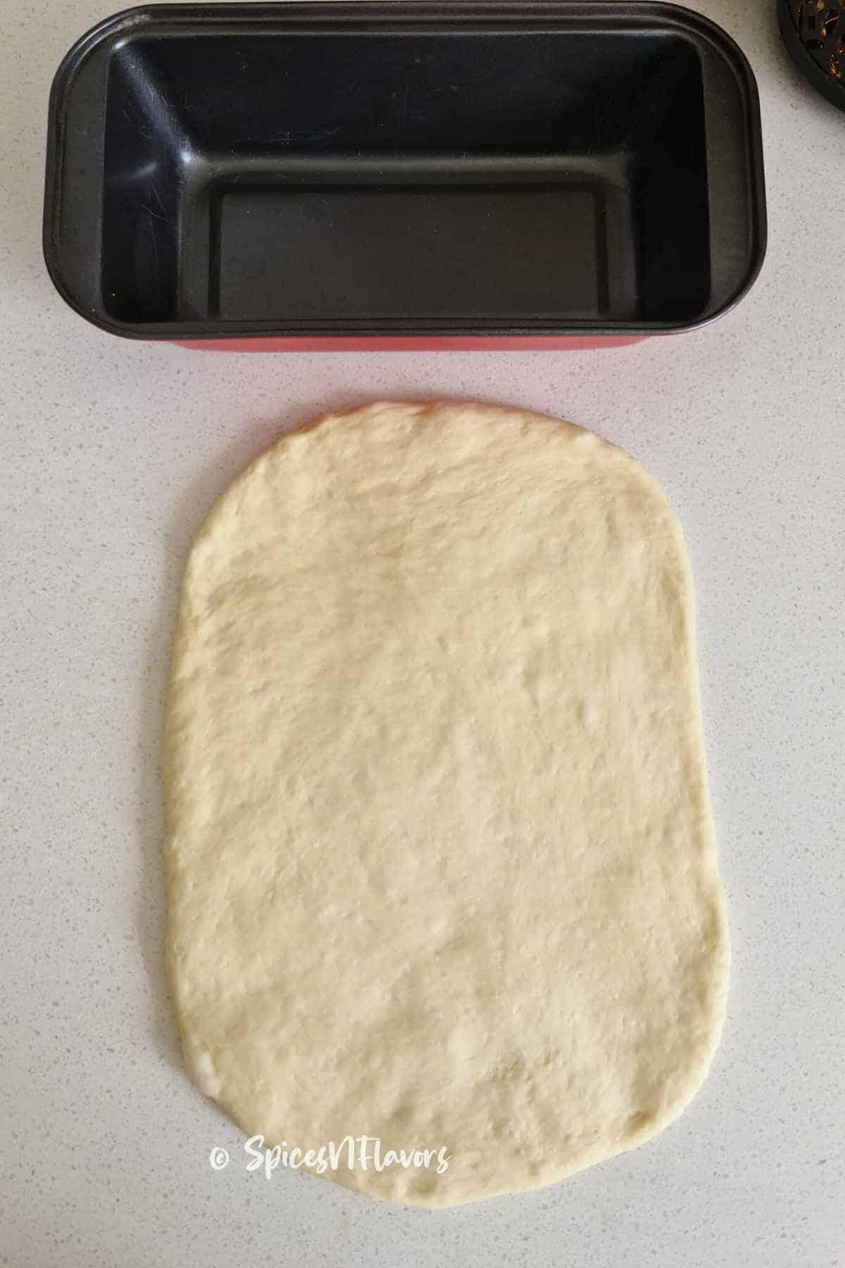 Roll the dough to fit your loaf pan