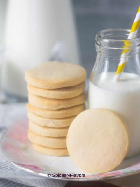 close up image of stacked air fryer sugar cookies to fit the recipe card