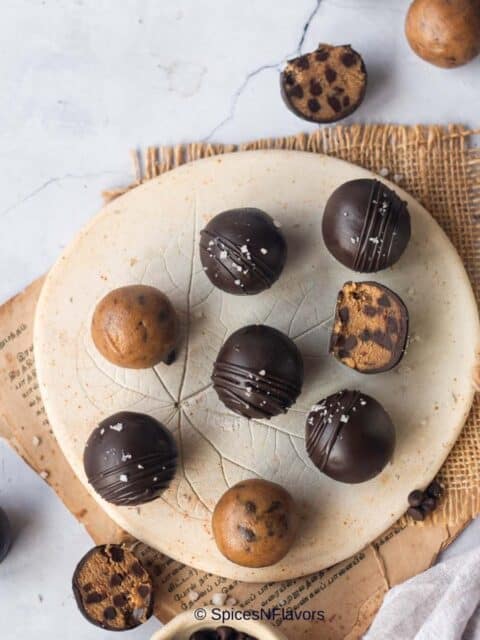 cropped up image of cookie balls laid on a flat surface to show the texture of cookie balls from within