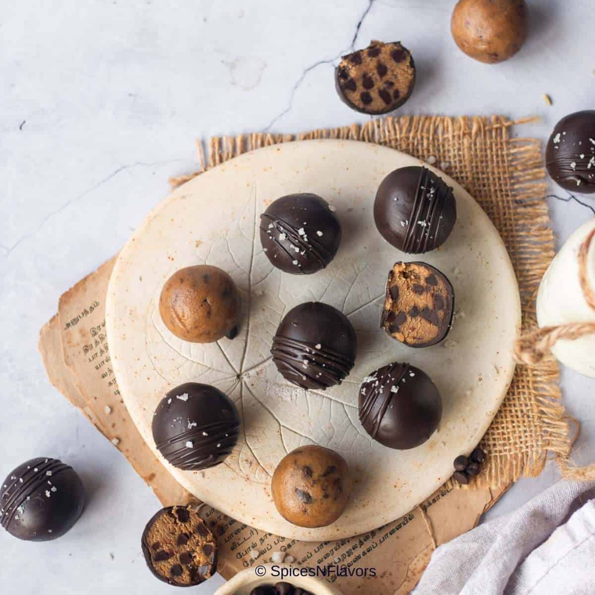 cropped up image of cookie balls laid on a flat surface to show the texture of cookie balls from within