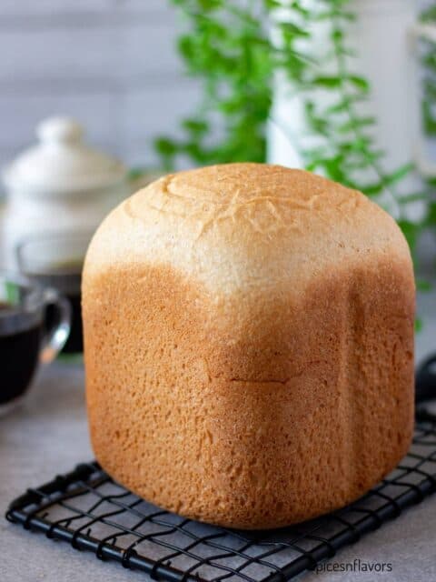 honey wheat bread placed on wire rack