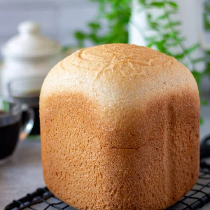 honey wheat bread placed on wire rack
