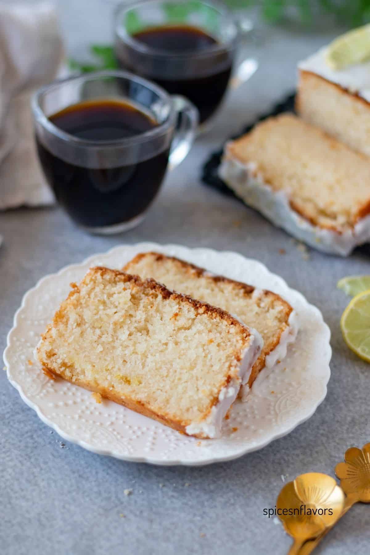 slice of lemon laof with coffee on the side