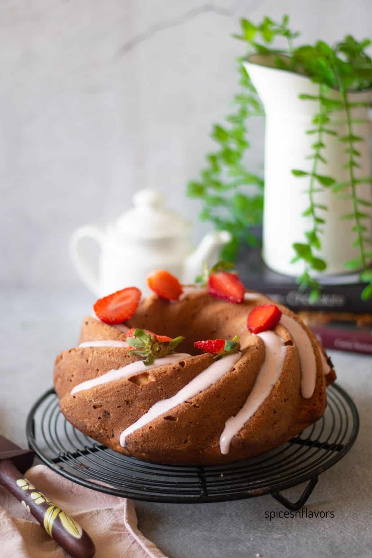 strawberry pound cake placed on a wire rack