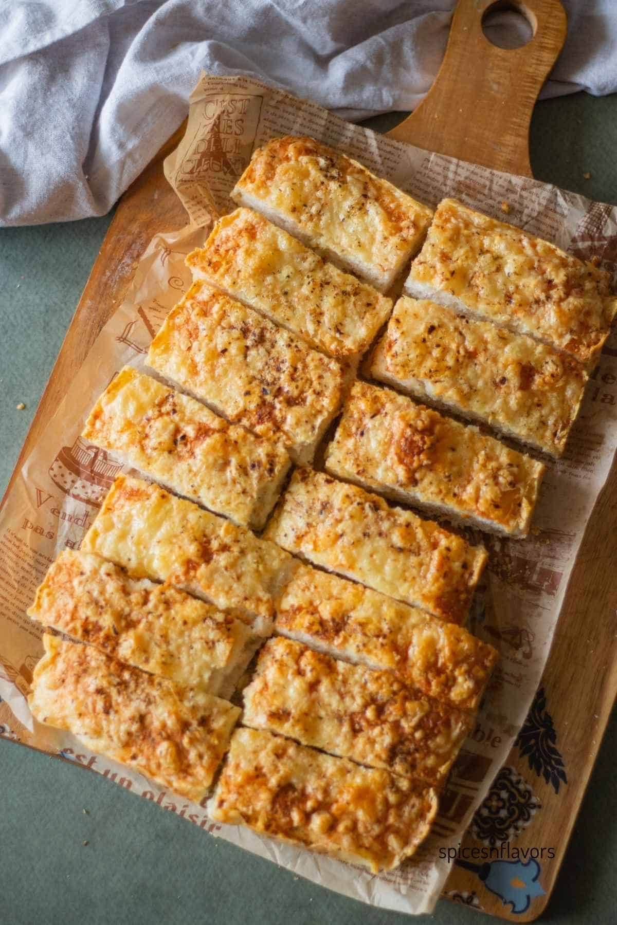 italian cheese bread sliced into 14 slices