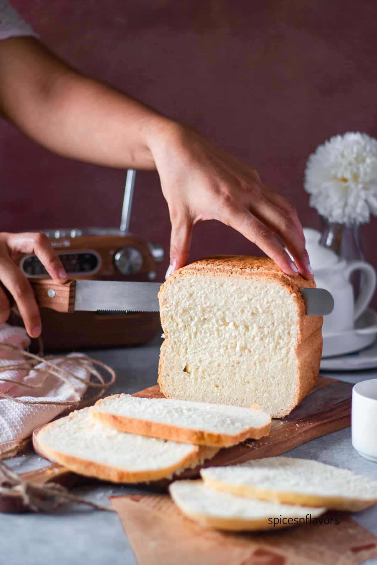 slicing japanese milk bread machine bread with a knife