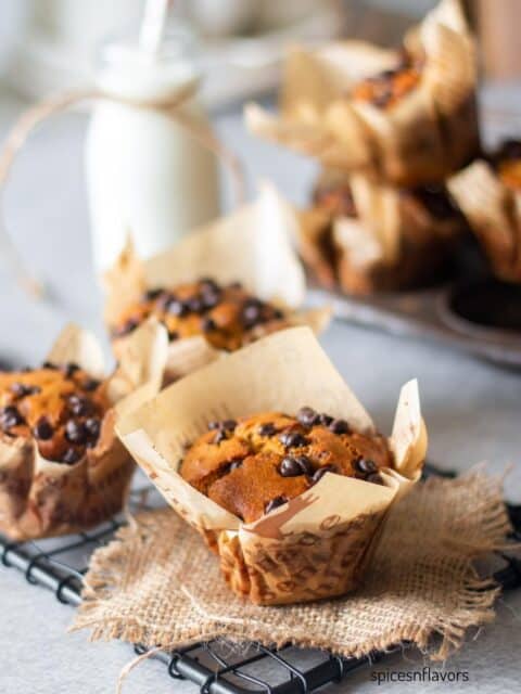 baked whole wheat muffins placed on a wire rack