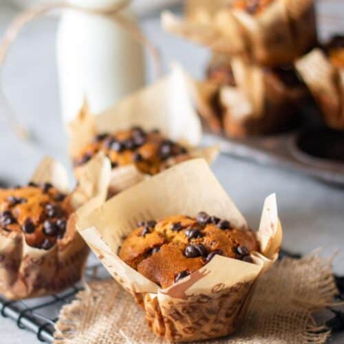 baked whole wheat muffins placed on a wire rack