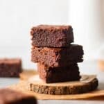 close up image of stacked eggless brownies