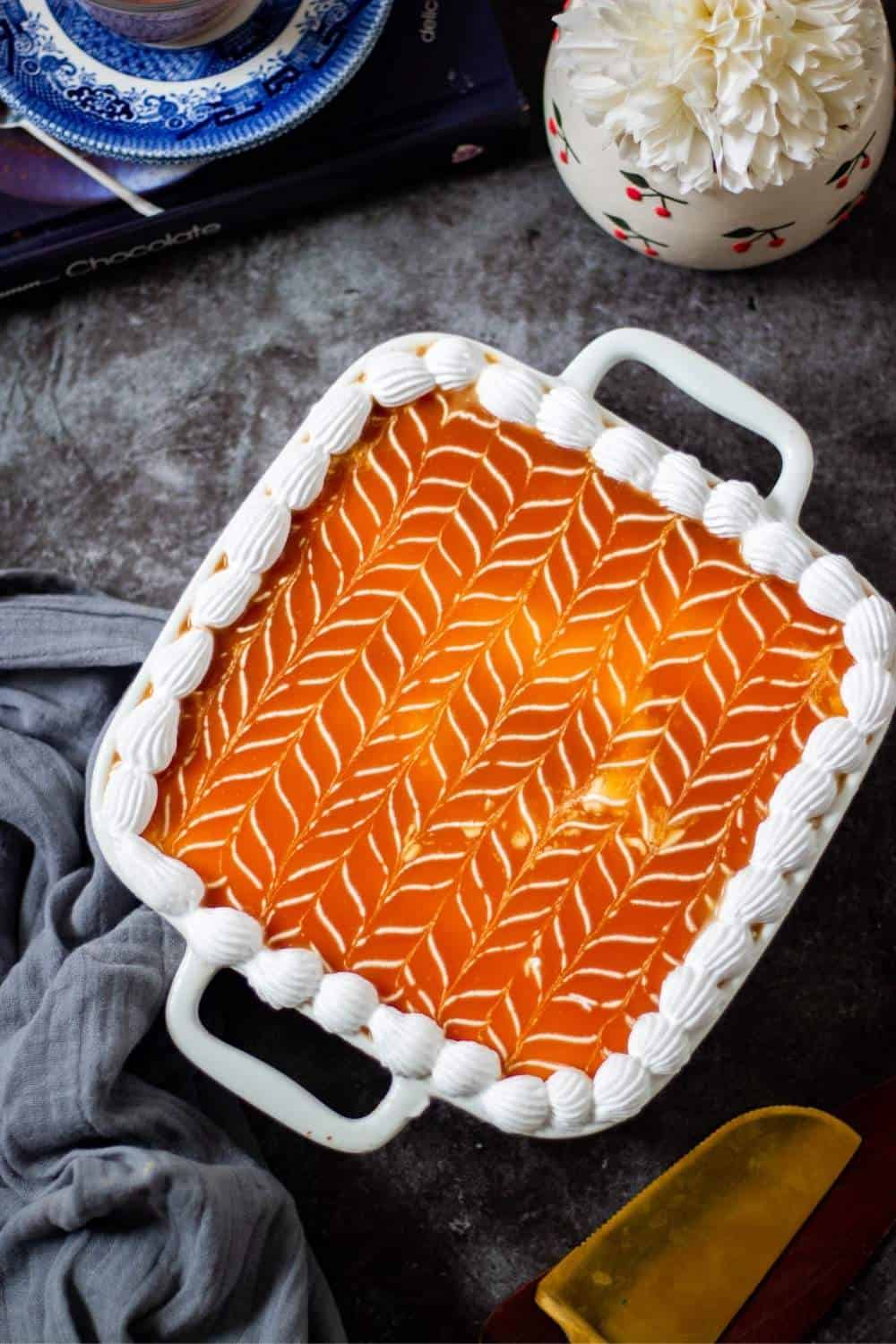 tres leches cake decorated with caramel sauce