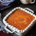 close up image of caramel tres leches cake to fit the recipe card size