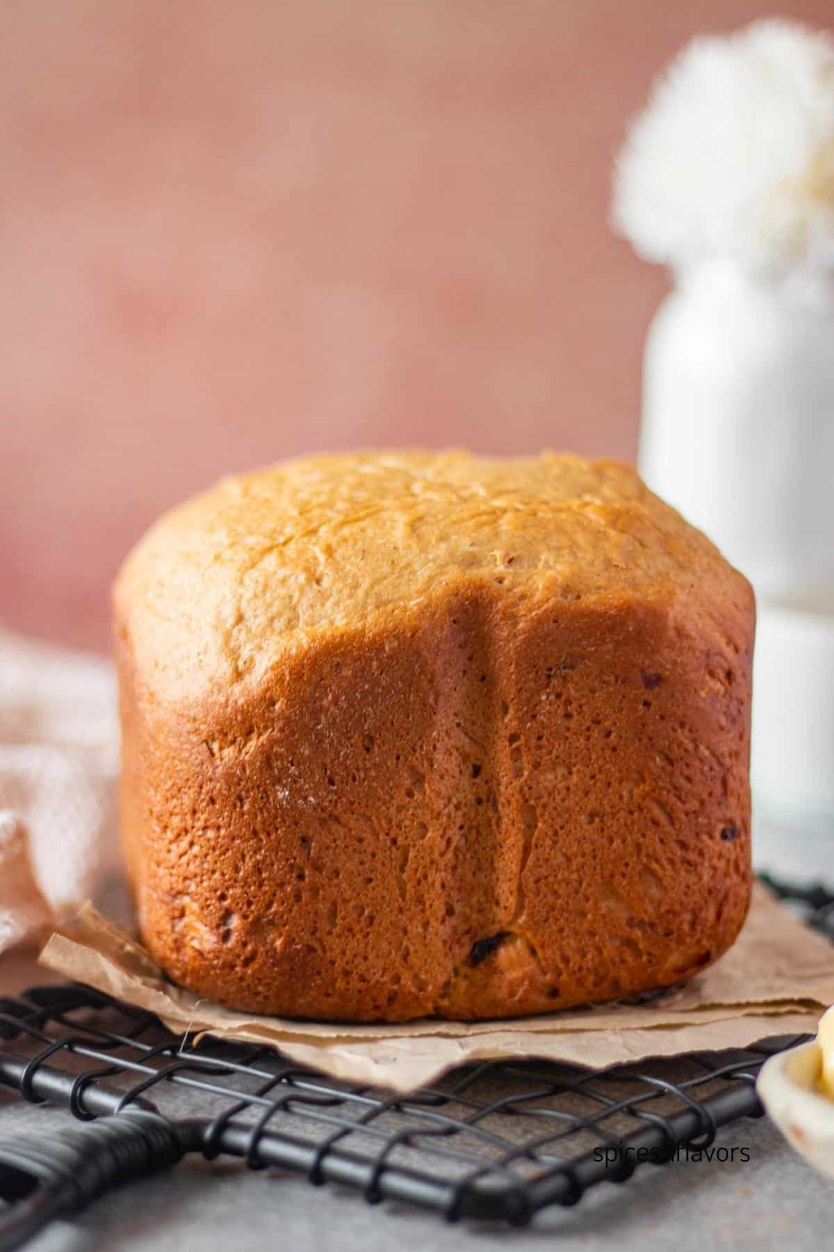 cinnamon raisin bread placed on wire rack