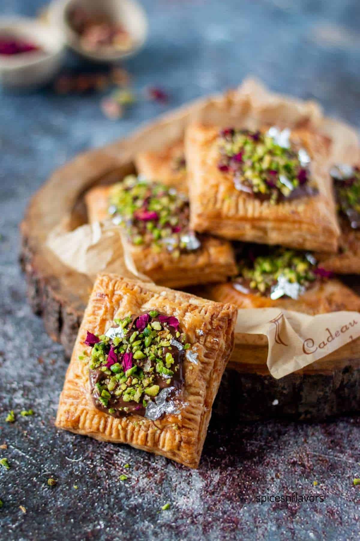 a single soan papdi nutella puffs kept in the front with few other in the background