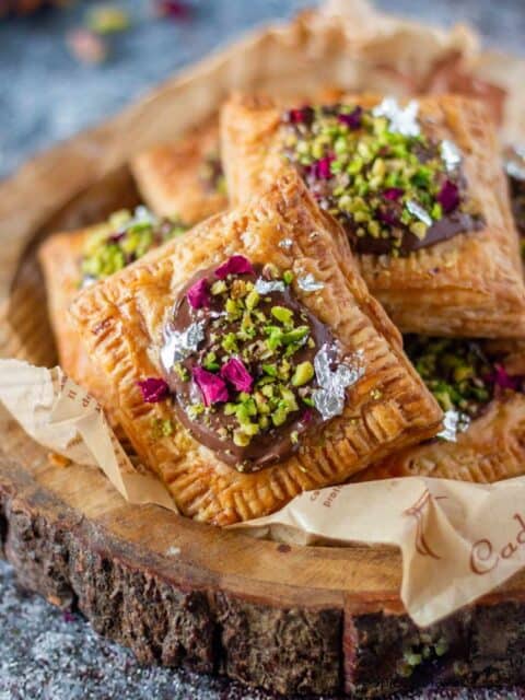 one of the soan papdi nutella squares placed in the front as focus to show textures