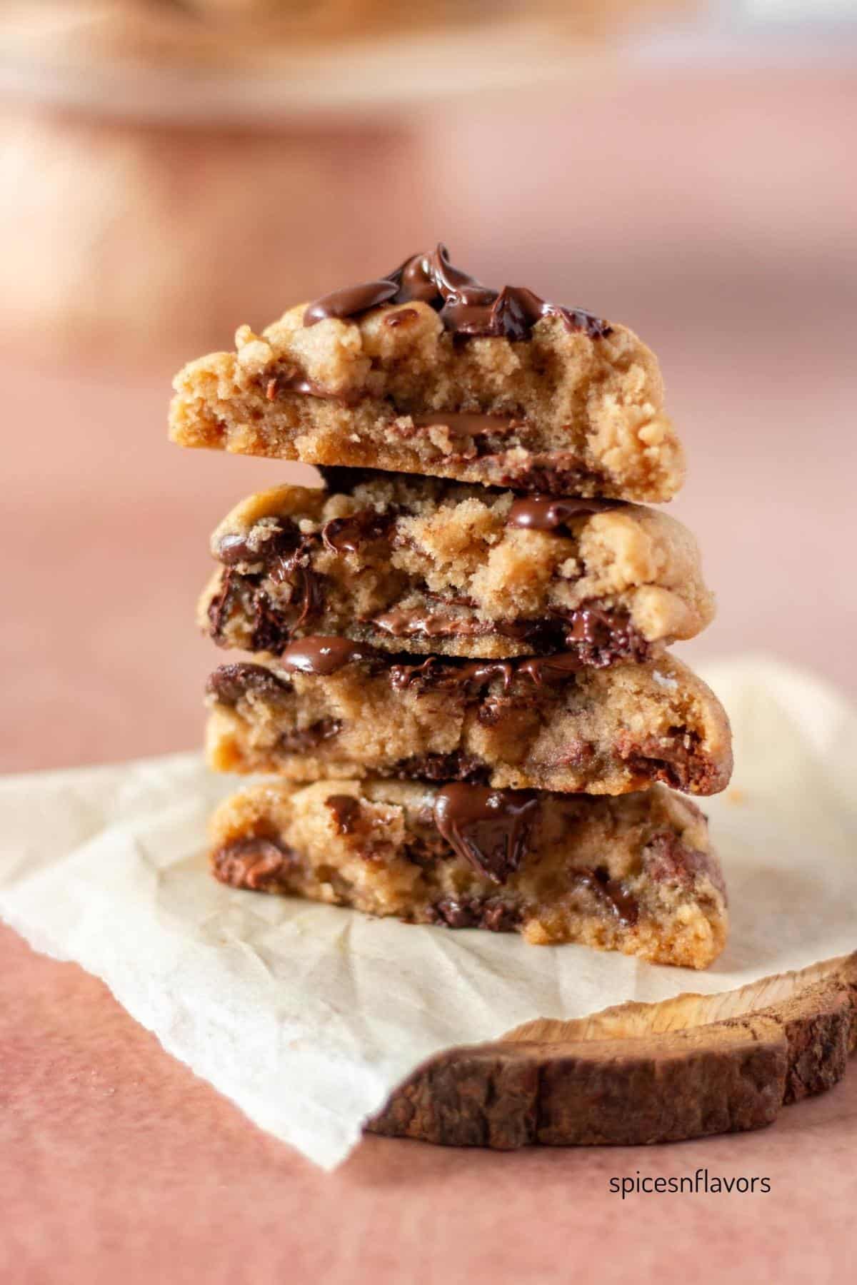 chai spiced chocolate chip cookies stacked on top of each other