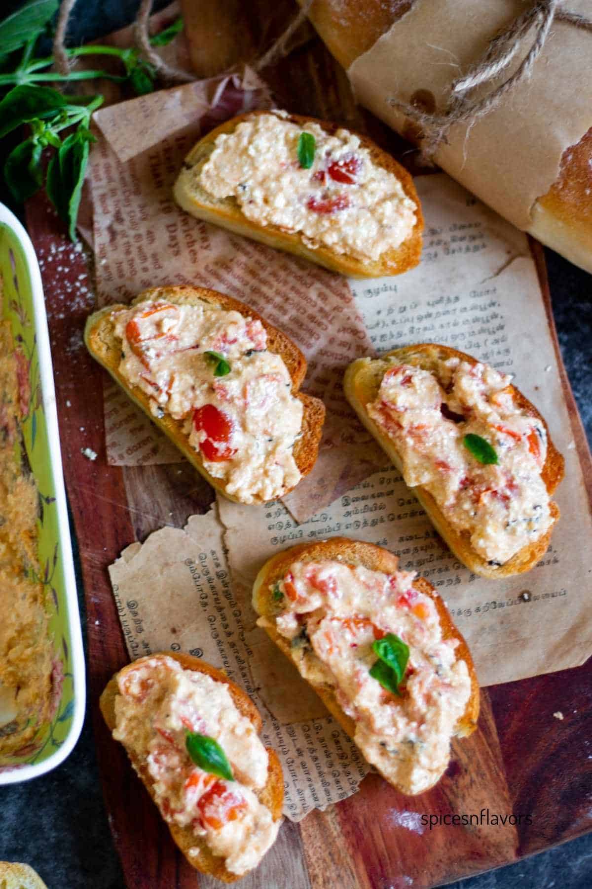 baked feta dip served on baguette slices