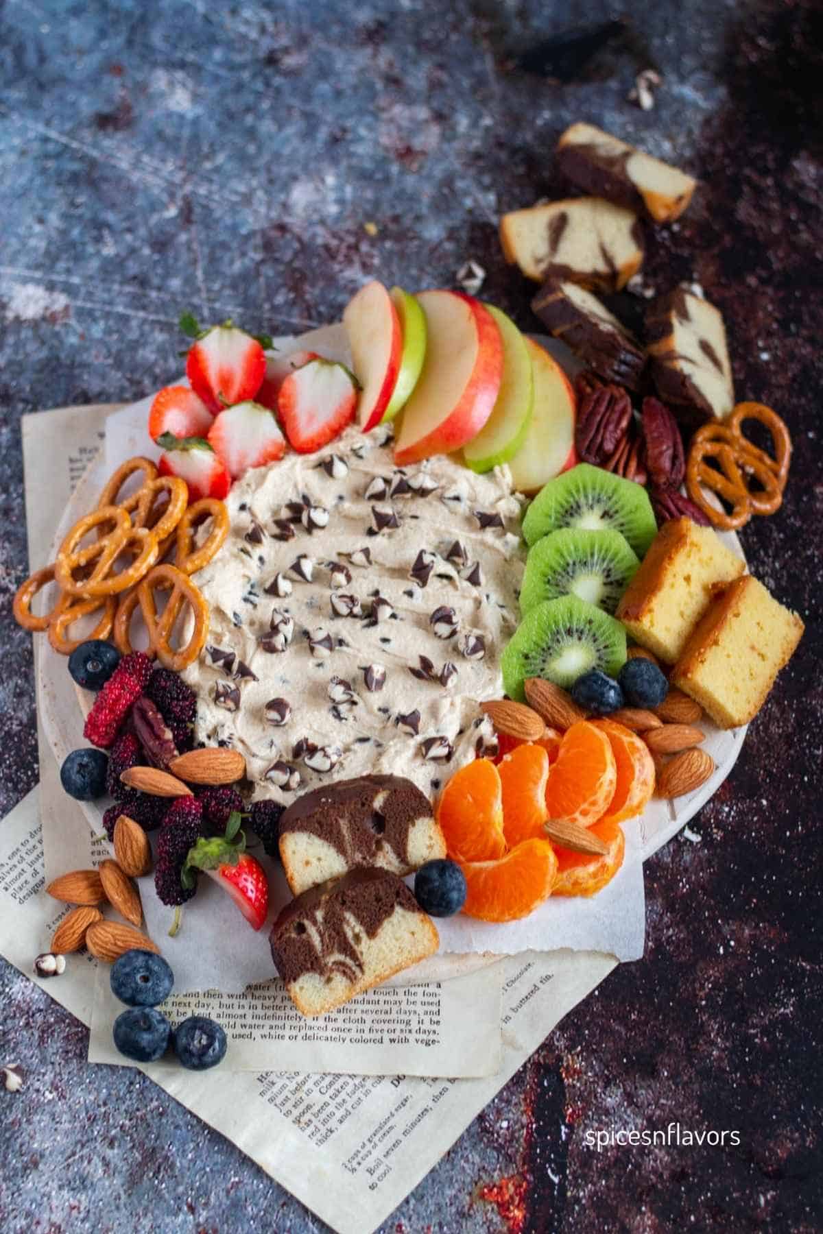 chocolate chip dip presented on wooden board