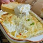 close up image of baked garlic dip to fit the recipe card size