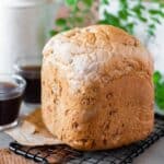 close up image of bread machine cranberry walnut bread to fit the recipe card