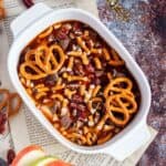 close up image of caramel dip placed in a white oval bowl