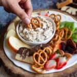 close up image of pretzel dipped in chocolate chip dip for recipe card