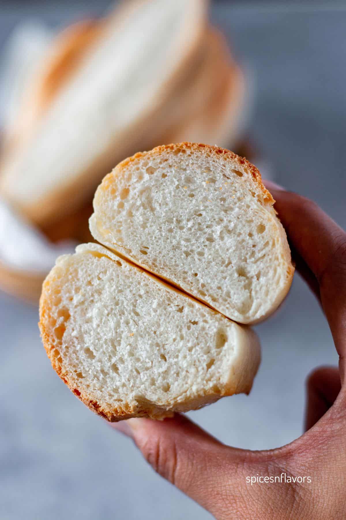 mini baguette sliced into two showing the soft texture within