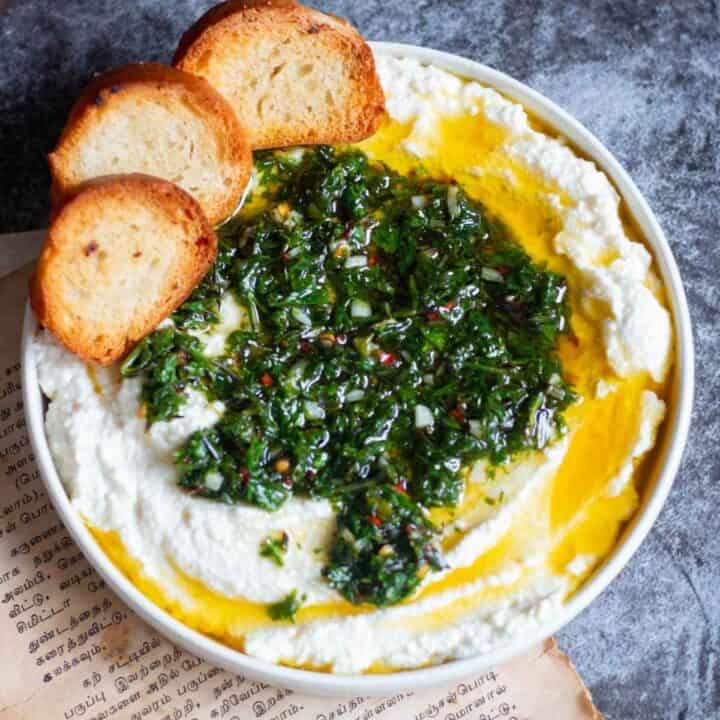 whipped ricotta dip with herbed oil on top