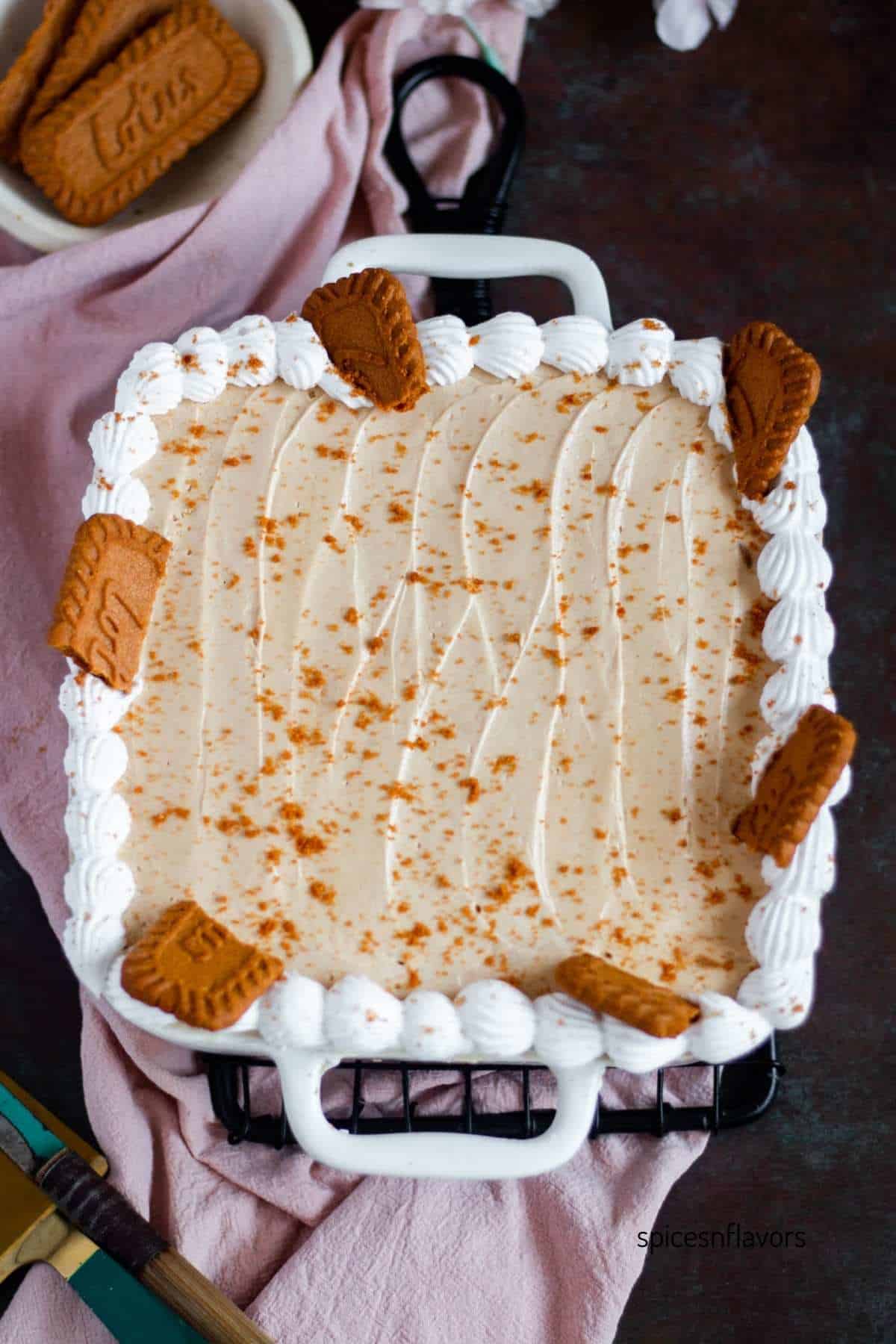 biscoff tres leches cake baked and decorated in the cake pan itself