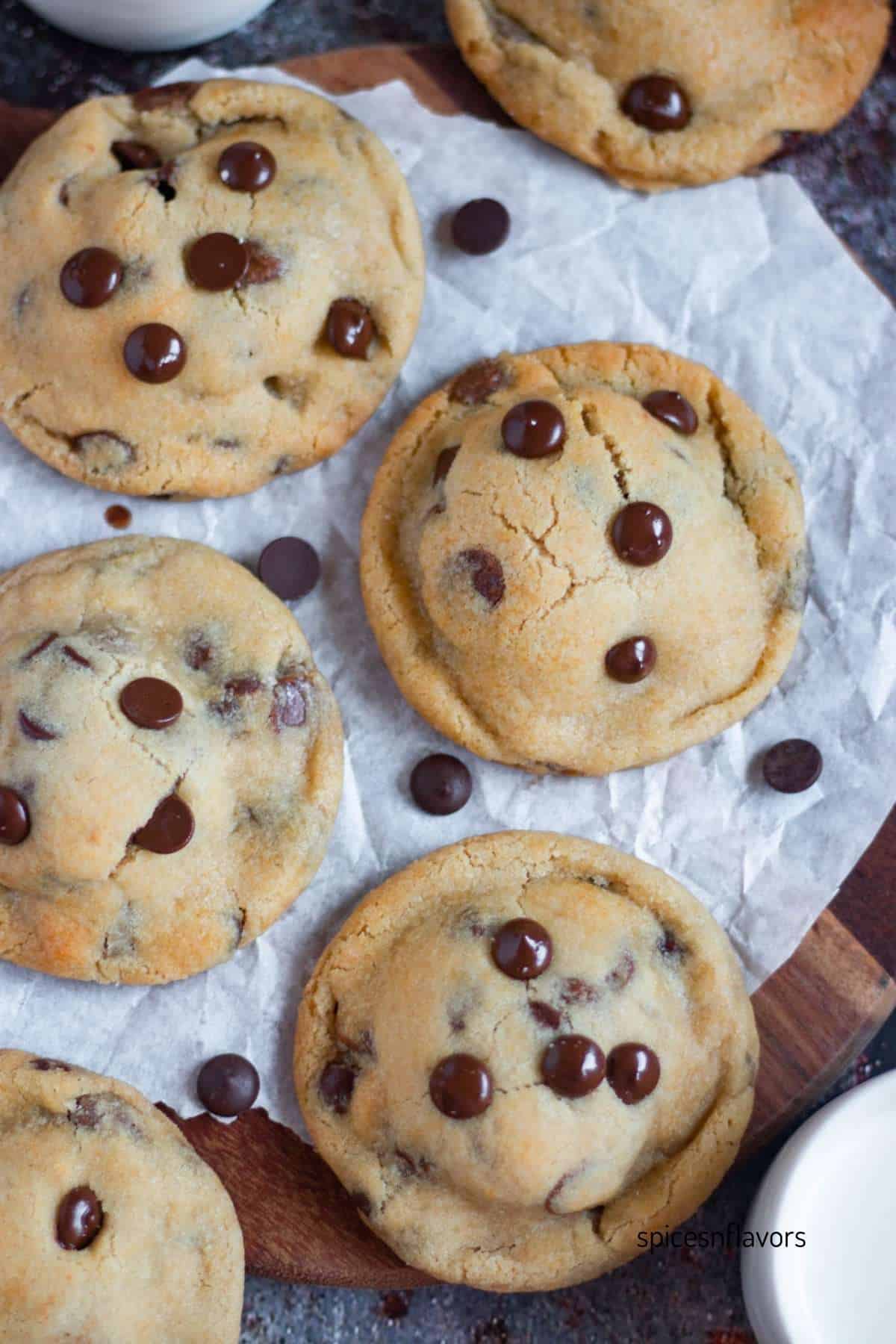six pieces of oreo stuffed chocolate chip cookies on wooden board